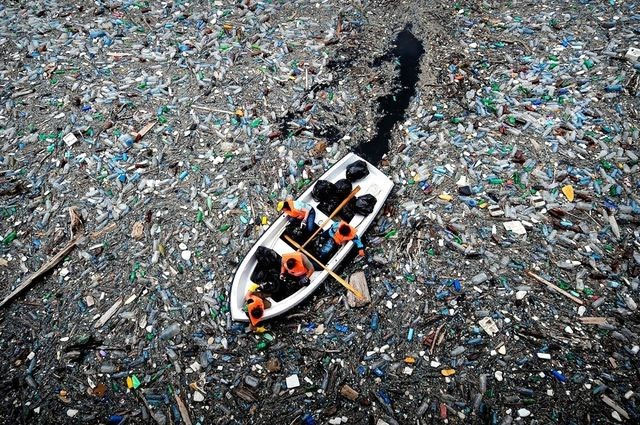 PET plastic pollution around boat