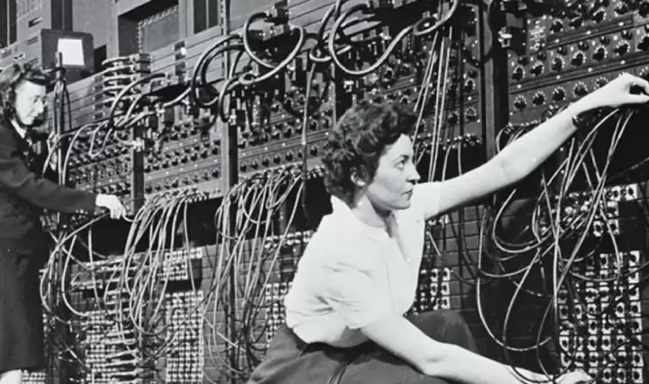 woman working on machinery