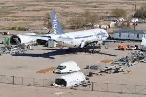 Airbus A310 being dismantled with the forward section of a Boeing 747 at Pinal Airpark